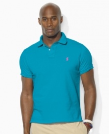 A classic-fitting short-sleeved polo shirt in breathable cotton mesh exudes iconic style with Ralph Lauren's signature embroidery. (Clearance) A classic-fitting short-sleeved polo shirt in breathable cotton mesh exudes iconic style with Ralph Lauren's signature embroidery. (Clearance)