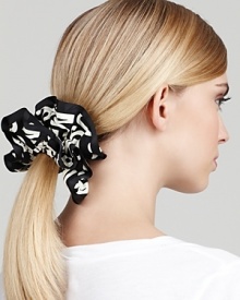 The scrunchie is back in high fashion from MARC BY MARC JACOBS, with a bold, logo print. Make a statement with your pony. The scrunchie is back in high fashion from MARC BY MARC JACOBS, with a bold, logo print. Make a statement with your pony.