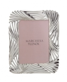 With gorgeous pleating in polished silver plate, the Pleated Swirl picture frame drapes beautiful places and people in exquisite Marchesa by Lenox style. With gorgeous pleating in polished silver plate, the Pleated Swirl picture frame drapes beautiful places and people in exquisite Marchesa by Lenox style.