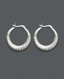 Timeless style to complement every look. Giani Bernini scallop hoops are crafted in polished sterling silver. Approximate diameter: 1 inch. Timeless style to complement every look. Giani Bernini scallop hoops are crafted in polished sterling silver. Approximate diameter: 1 inch.