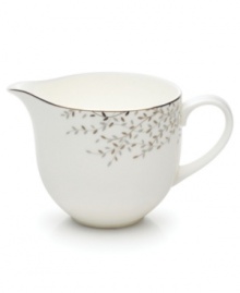 Fringed with shimmering leaves of platinum and mica, this bone china creamer turns your table into a springtime utopia. Its simply sleek shape is a vision of modern elegance in platinum-banded white. Fringed with shimmering leaves of platinum and mica, this bone china creamer turns your table into a springtime utopia. Its simply sleek shape is a vision of modern elegance in platinum-banded white.