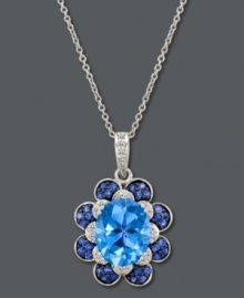 A true blue sensation. Le Vian's cool pendant features a beautiful flower shape with an oval-cut blue topaz at center (3-9/10 ct. t.w.) surrounded by petals decorated with diamonds (1/10 ct. t.w.) and sapphires (1/3 ct. t.w.). Set in 14k white gold. Approximate length: 18 inches. Approximate drop: 1 inch. A true blue sensation. Le Vian's cool pendant features a beautiful flower shape with an oval-cut blue topaz at center (3-9/10 ct. t.w.) surrounded by petals decorated with diamonds (1/10 ct. t.w.) and sapphires (1/3 ct. t.w.). Set in 14k white gold. Approximate length: 18 inches. Approximate drop: 1 inch.