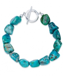 Add a touch of turquoise. Avalonia Road's pretty toggle bracelet features asymmetrical nuggets of turquoise (21 ct. t.w.) in sterling silver. Approximate length: 7-1/2 inches. Add a touch of turquoise. Avalonia Road's pretty toggle bracelet features asymmetrical nuggets of turquoise (21 ct. t.w.) in sterling silver. Approximate length: 7-1/2 inches.