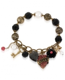 The key to your heart, this multi-charm half stretch bracelet from Betsey Johnson truly dazzles. It's crafted from antique gold-tone mixed metal with glass pearls and sparkling accents. Item comes packaged in a signature Betsey Johnson Gift Box. Approximate length: 7-1/2 inches. The key to your heart, this multi-charm half stretch bracelet from Betsey Johnson truly dazzles. It's crafted from antique gold-tone mixed metal with glass pearls and sparkling accents. Item comes packaged in a signature Betsey Johnson Gift Box. Approximate length: 7-1/2 inches.