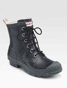 Utility-style rubber in two tones with the classic Hunter logo at front.Heel, 1 (25mm) Shaft, 6 Leg circumference, 12 Pull-on style Padded insole Rubber sole Imported Please note: During manufacturing, a white wax is inserted into the mix to protect the rubber. This wax can give these boots a white, cloudy look called blooming. It does this to protect the rubber from drying out. 