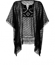 Super stylish black boxy top from Anna Sui - The boho chic look is effortlessly achieve in this boxy fit black sheer top - Slit neckline with front embellishment, 3/4-dolman sleeves, Handkerchief hem with fringe detail - Pair with leather leggings, a bold shouldered blazer, and platforms