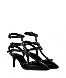 Opt for the iconic this season with Valentinos jet black leather pumps, decorated with characteristic rockstuds guaranteed to give that covetable edge to your outfit - Pointed toe, black leather upper with tonal leather straps and trim, platinum-toned hardware - Rounded kitten heel - Wear with everything from ankle jeans and blazers to cocktail dresses