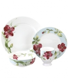 A beautiful arrangement, the Sweet Blossom place setting by Oleg Cassini accents casual tables in graceful garden style. Painterly lilies bloom on durable porcelain crafted in classically elegant forms. A beautiful arrangement, the Sweet Blossom place setting by Oleg Cassini accents casual tables in graceful garden style. Painterly lilies bloom on durable porcelain crafted in classically elegant forms.
