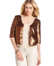 Allover high-shine sequins makes this metallic GUESS cropped jacket a surefire pick for an ultra-chic layered look! Allover high-shine sequins makes this metallic GUESS cropped jacket a surefire pick for an ultra-chic layered look!