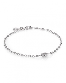 A delicate diamond pavé station centers PANDORA's 18K white gold bracelet.