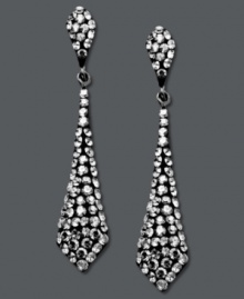 It's a black tie affair. Kaleidoscope's elegant tie-shaped drop earrings shine feature round-cut smokey crystals. Set in sterling silver with Swarovski elements. Approximate drop: 1-1/2 inches. It's a black tie affair. Kaleidoscope's elegant tie-shaped drop earrings shine feature round-cut smokey crystals. Set in sterling silver with Swarovski elements. Approximate drop: 1-1/2 inches.