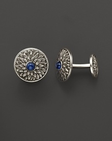 Elegant, intricately textured sterling silver cufflinks, set with sapphires, from Buccellati.