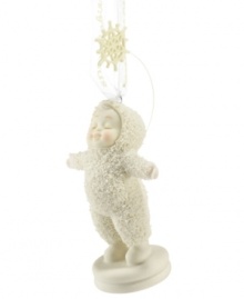 Let it snow! A sweet Snowbaby enjoys the snow in this lovely ornament from Department 56, bringing the lasting holiday tradition to your home this season. Crafted of pure porcelain bisque. Let it snow! A sweet Snowbaby enjoys the snow in this lovely ornament from Department 56, bringing the lasting holiday tradition to your home this season. Crafted of pure porcelain bisque.