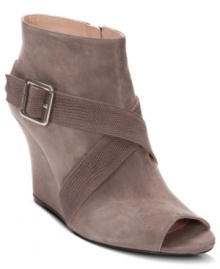 Smooth suede is the perfect backdrop for sexy crisscrossing straps. Let Vince Camuto's Pamari booties add some luxurious style to your look.