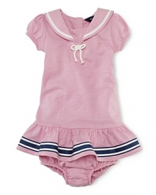 A simply sweet cotton jersey dress is accented with nautical-inspired details for a preppy look. A simply sweet cotton jersey dress is accented with nautical-inspired details for a preppy look.