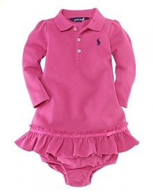 A long-sleeved polo dress in stretch cotton mesh is finished with a pretty drop waist and a ruffled hem. A long-sleeved polo dress in stretch cotton mesh is finished with a pretty drop waist and a ruffled hem.