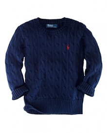 The long-sleeved crewneck sweater is cable-knit in soft combed cotton for a classic, iconic look. The long-sleeved crewneck sweater is cable-knit in soft combed cotton for a classic, iconic look.