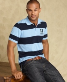 Trim down your summer wardrobe with this slim-fit polo shirt from Tommy Hilfiger.