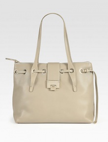 From the 24:7 Collection. Uniquely versatile grainy leather bag, topped with a slim belt looping through edgy grommets.Shoulder straps, 9 drop Top zip with flip-lock strap closure Protective metal feet One inside zip pocket Two inside open pockets Suede lining 15W X 11H X 8D Made in Italy From the 24:7 Collection. Uniquely versatile grainy leather bag, topped with a slim belt looping through edgy grommets.Shoulder straps, 9 drop Top zip with flip-lock strap closure Protective metal feet One inside zip pocket Two inside open pockets Suede lining 15W X 11H X 8D Made in Italy
