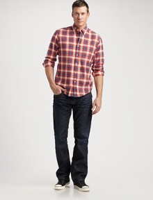 A relaxed fit with modern sensibilities, rendered with embroidered back flap pockets and dark, gently faded denim. Five-pocket style Signature stitching on back pockets Inseam, about 34 Cotton Machine wash Made in USA A relaxed fit with modern sensibilities, rendered with embroidered back flap pockets and dark, gently faded denim. Five-pocket style Signature stitching on back pockets Inseam, about 34 Cotton Machine wash Made in USA