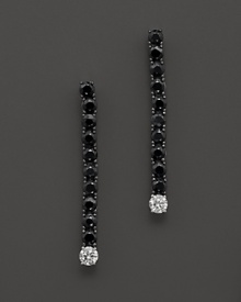 Faceted diamonds and black sapphires sets in 18K. white gold by Roberto Coin.