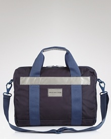 Whether you're walking to work or hopping on your bike, this sporty, versatile messenger bag protects your laptop and other essentials. Whether you're walking to work or hopping on your bike, this sporty, versatile messenger bag protects your laptop and other essentials.