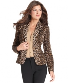 Take a walk on the wild side in Jones New York Signature's fitted blazer, complete with a bold animal print.