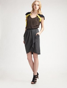 Cotton knit is soften with a ruched waist and gently draped front.Elastic waist Side pockets Asymmetric hem About 21¾ long 95% cotton/5% polyurethane Dry clean Imported Cotton knit is soften with a ruched waist and gently draped front.Elastic waist Side pockets Asymmetric hem About 21¾ long 95% cotton/5% polyurethane Dry clean Imported