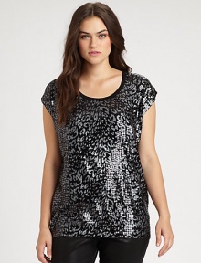 Designed to stand out from the crowd, this jersey top features cheetah foil print and shimmering sequins. Wear this knit design with luxe leather pants or coated-denim jeans.Round neckCap sleevesSequin frontSolid backPull-on styleAbout 28 from shoulder to hemRayonHand washImported