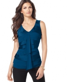 Add dimension to your look with this tiered petite top from Alfani. A draped front panel creates a flowy, feminine look that works with pants and skirts alike. Add dimension to your look with this tiered petite top from Alfani. A draped front panel creates a flowy, feminine look that works with pants and skirts alike.