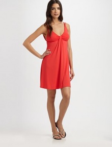 A twist-front neckline with subtle draped details give this feminine coverup a simply chic look.Twist-front topBraided strapsPull-on style87% nylon/13% spandexHand washImported A twist-front neckline with subtle draped details give this feminine coverup a simply chic look.Twist-front topBraided strapsPull-on style87% nylon/13% spandexHand washImported