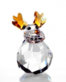 Inspired by the famous Rudolph, this playful reindeer sparkles in clear crystal with a Crystal Copper nose and horns. With a specially designed base, this adorable creation rocks gently back and forth at the touch of your hand. The perfect companion for the Rocking Angel and Rocking Snowman!