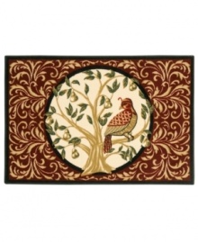 On the first day of Christmas! Evoking the beloved holiday carol, Shaw's lovely rug features a beautifully rendered partridge perched at the center of an elegant swirl design. Constructed of recyclable nylon, the rug adds a wonderful look to your decor without the extra impact on mother nature.