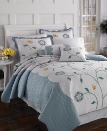 The Butterfly Meadow quilt features a centered, whimsical florals and bright yellow butterflies across lofty quilting. With soft scalloped borders, this nature-inspired quilt is the perfect bedding solution for breezy spring and summer nights. The Butterfly Meadow quilt features a centered, whimsical florals and bright yellow butterflies across lofty quilting. With soft scalloped borders, this nature-inspired quilt is the perfect bedding solution for breezy spring and summer nights.