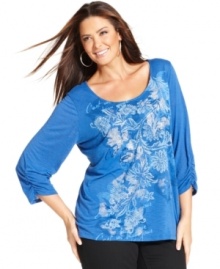 Blossom beauty this season with Style&co.'s three-quarter-sleeve plus size top, featuring a floral-print!