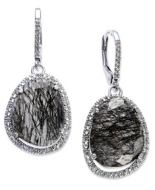 Inspired by nature, these stunning drop earrings highlight organically-shaped black rutilated quartz (12-1/4 ct. t.w.) stones surrounded by round-cut diamonds (1/6 ct. t.w.). Set in sterling silver. Approximate drop: 1-1/4 inches. Inspired by nature, these stunning drop earrings highlight organically-shaped black rutilated quartz (12-1/4 ct. t.w.) stones surrounded by round-cut diamonds (1/6 ct. t.w.). Set in sterling silver. Approximate drop: 1-1/4 inches.