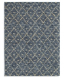 A subtle, hushed pattern of diamonds and dots against an exquisite indigo ground enhances any decor with soft-textured style. This statement-making rug from Karastan is woven from 100% premium worsted 2-ply wool for a soft hand and long-lasting wear.