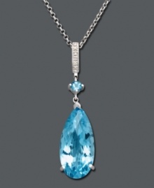 Dress up your evening wear with a bright splash of color. This elegant teardrop pendant features vibrant blue topaz (16-1/2 ct. t.w.) accented by sparkling diamonds. Crafted in sterling silver. Approximate length: 18 inches. Approximate drop: 2 inches. Dress up your evening wear with a bright splash of color. This elegant teardrop pendant features vibrant blue topaz (16-1/2 ct. t.w.) accented by sparkling diamonds. Crafted in sterling silver. Approximate length: 18 inches. Approximate drop: 2 inches.