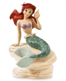Splash! Ariel takes a break from the world under the sea in this lovely commemorative Disney figurine. Accented with 24-karat gold and measures 7.25. Splash! Ariel takes a break from the world under the sea in this lovely commemorative Disney figurine. Accented with 24-karat gold and measures 7.25.