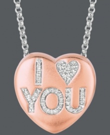 Sugary sweet and perfectly sentimental. Sweethearts' adorable heart-shaped pendant expresses more that just great style with the words I LOVE YOU spelled out in round-cut diamonds (1/8 ct. t.w.) across the surface. Pendant crafted in 14k rose gold over sterling silver and sterling silver. Copyright © 2011 New England Confectionery Company. Approximate length: 16 inches + 2-inch extender. Approximate drop: 5/8 inch. Sugary sweet and perfectly sentimental. Sweethearts' adorable heart-shaped pendant expresses more that just great style with the words I LOVE YOU spelled out in round-cut diamonds (1/8 ct. t.w.) across the surface. Pendant crafted in 14k rose gold over sterling silver and sterling silver. Copyright © 2011 New England Confectionery Company. Approximate length: 16 inches + 2-inch extender. Approximate drop: 5/8 inch.