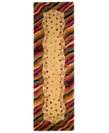 A polka dot pattern against a subtle creme background creates an abstract rug of rich, artistic beauty. A vivid, swirling border in a color palette that includes burgundy, lavender and beige completes the rug with a resplendent finish. Hand-tufted and hand-carved of plush wool. A polka dot pattern against a subtle creme background creates an abstract rug of rich, artistic beauty. A vivid, swirling border in a color palette that includes burgundy, lavender and beige completes the rug with a resplendent finish. Hand-tufted and hand-carved of plush wool.