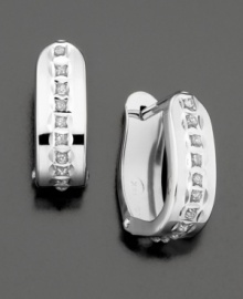 Pavé diamond accents and substantial shape lend traditional hoop earrings a modern edge. Pavé diamond accents and substantial shape lend traditional hoop earrings a modern edge.