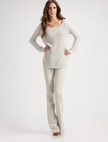 Semi-sheer, open-knit crewneck in pure wool, concluded with dropped shoulders and ribbed details. CrewneckDropped shouldersLong sleevesRibbed cuffs and hemLonger length hits below the hipsWoolDry cleanImported Semi-sheer, open-knit crewneck in pure wool, concluded with dropped shoulders and ribbed details. CrewneckDropped shouldersLong sleevesRibbed cuffs and hemLonger length hits below the hipsWoolDry cleanImported