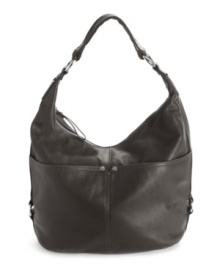 A polished leather hobo from Tignanello with plenty of pockets to keep you and your essentials organized. A polished leather hobo from Tignanello with plenty of pockets to keep you and your essentials organized.