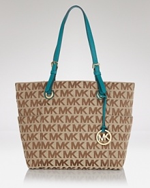 Day bags don't come much chicer (or easier) than this style from MICHAEL Michael Kors. Crafted from leather this roomy style adds instant glamor to your look. Day bags don't come much chicer (or easier) than this style from MICHAEL Michael Kors. Crafted from leather this roomy style adds instant glamor to your look.