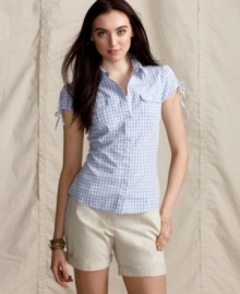 Spring into a fresh look with this cotton button-front shirt from Tommy Hilfiger. Priced low and high in style, it's an essential staple.