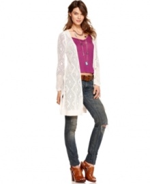 In a sheer crochet perfect for spring, this Free People long cardigan is an airy layering piece!