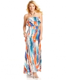 Adopt the season's bold fashion attitude with this maxi dress from GUESS? that marries a chic, ruffled neckline design with a powerful print!