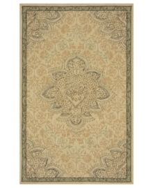This soft, sophisticated piece lends earthy tones to any patio, veranda or indoor space. Featuring a beautiful center medallion on light tan ground, this durable area rug is hand-hooked of strong, polypropylene fibers. This soft, sophisticated piece lends earthy tones to any patio, veranda or indoor space. Featuring a beautiful center medallion on light tan ground, this durable area rug is hand-hooked of strong, polypropylene fibers.