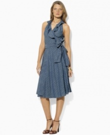 Drawing inspiration from classic menswear style with slim stripes and soft chambray shirting, Lauren Jeans Co.'s flattering wrap design is decidedly feminine with a ruffled V-neckline and full, flowing skirt. Drawing inspiration from classic menswear style with slim stripes and soft chambray shirting, Lauren Jeans Co.'s flattering wrap design is decidedly feminine with a ruffled V-neckline and full, flowing skirt.